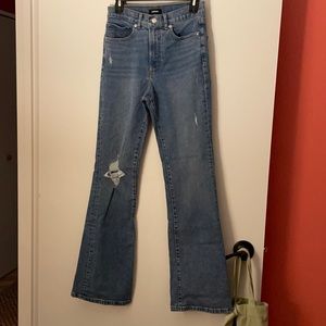 Ripped Boot Cut Jeans